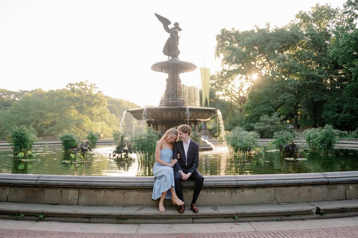 couple sitting at bethesda fountain in New York City, Central Park