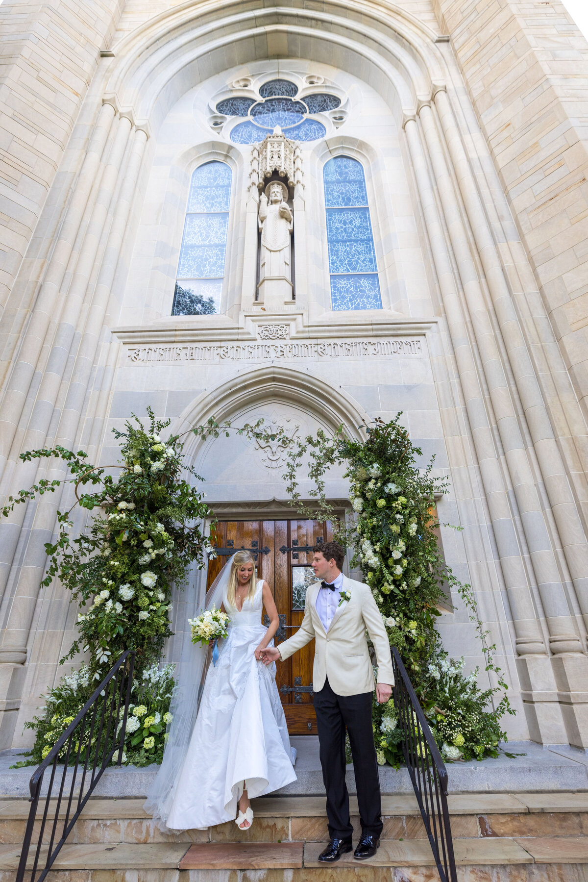 Bride and Groom exit  Wedding at Christ the King Atlanta