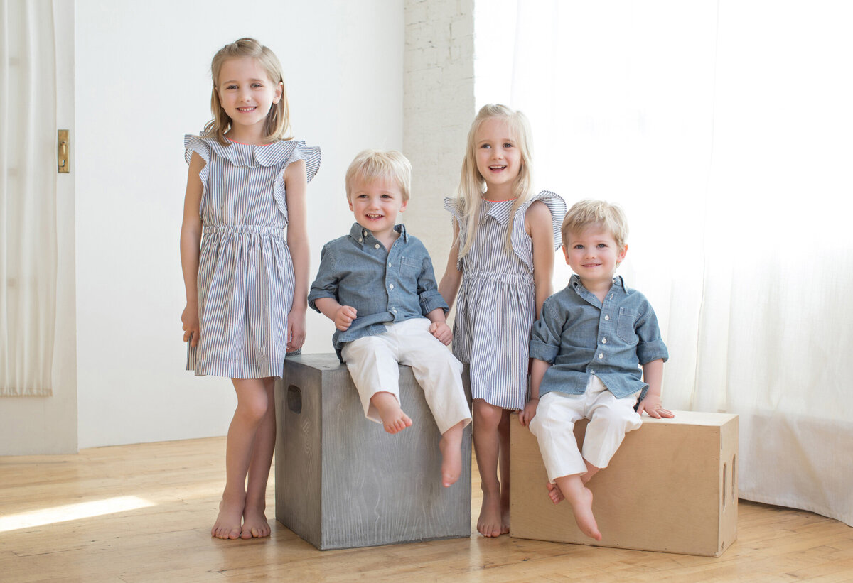 siblings-seated-in-denim