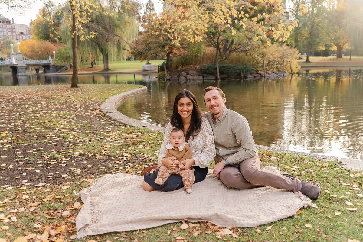 family on picnic blanket taken by boston area family photographer​