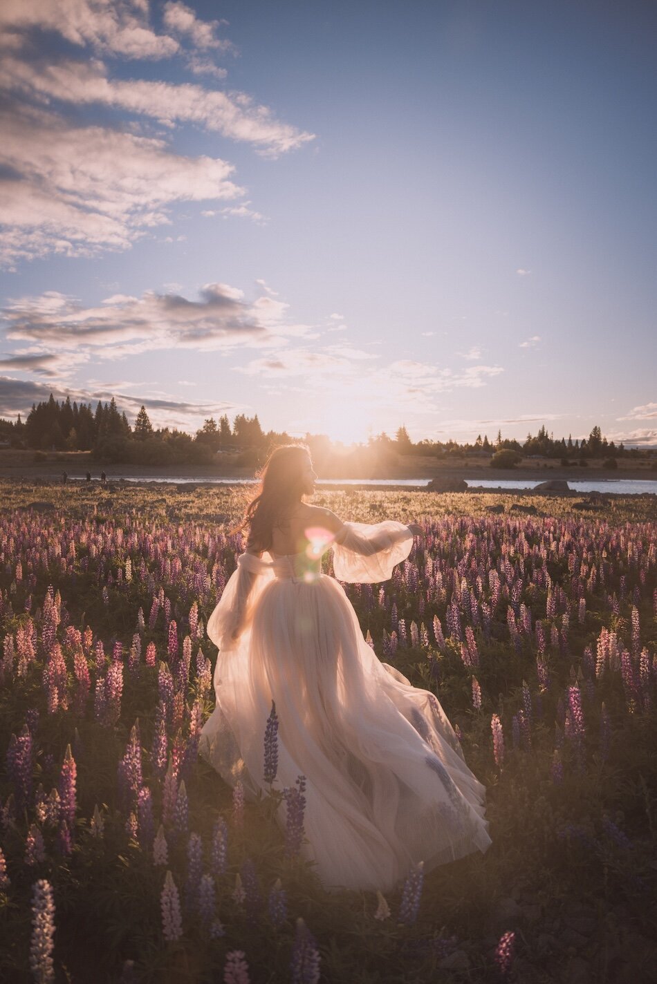 Pre-wedding photoshoot, the lupins, Lake Tekapo. Galia Lahav Haute Couture gown.