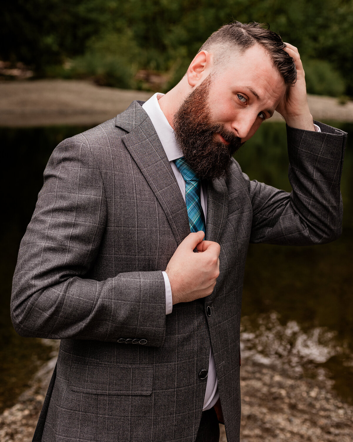 Groom runs his fingers through his hair
