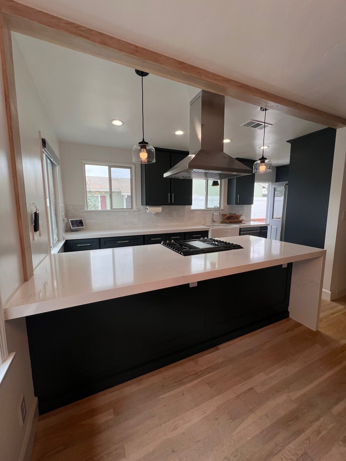 modern-black-cabinet-kitchen-open-island-layout