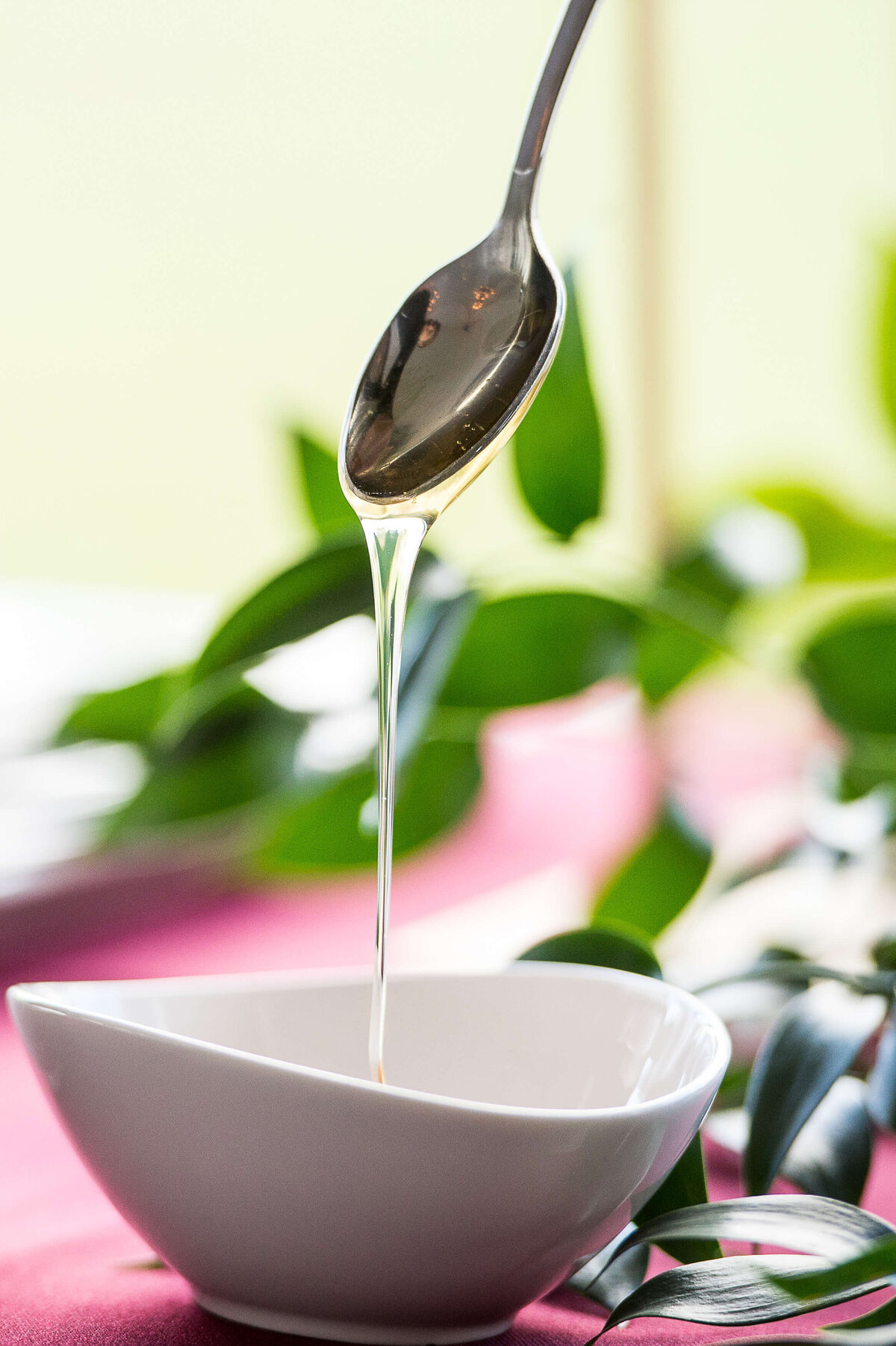 a delicious spoonful of honey as part of the tea condiments for a corporate anniversary event.  Captured by Ottawa Event Photographer JEMMAN Photography COMMERCIAL