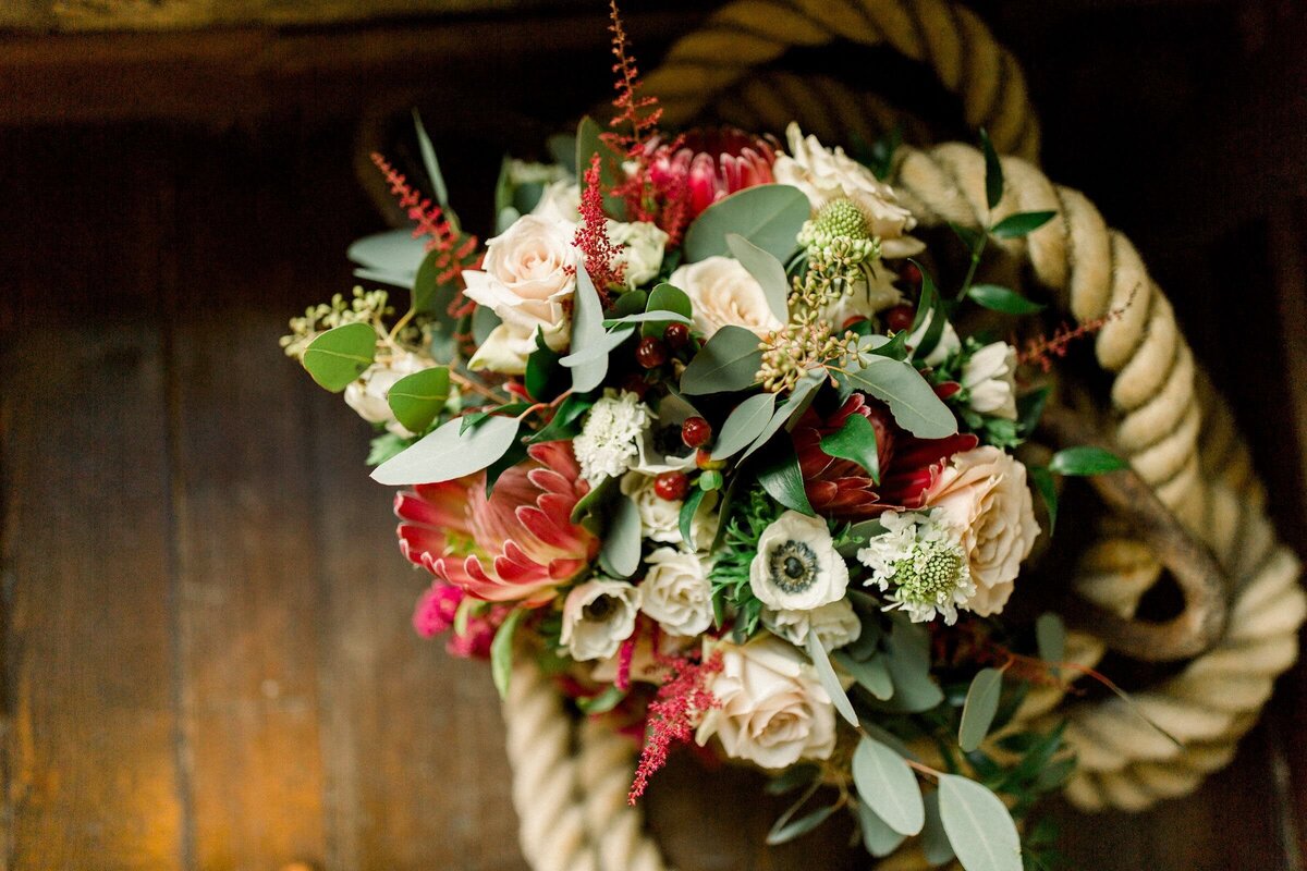 Wild and bold bridal bouquet in white and burgundy