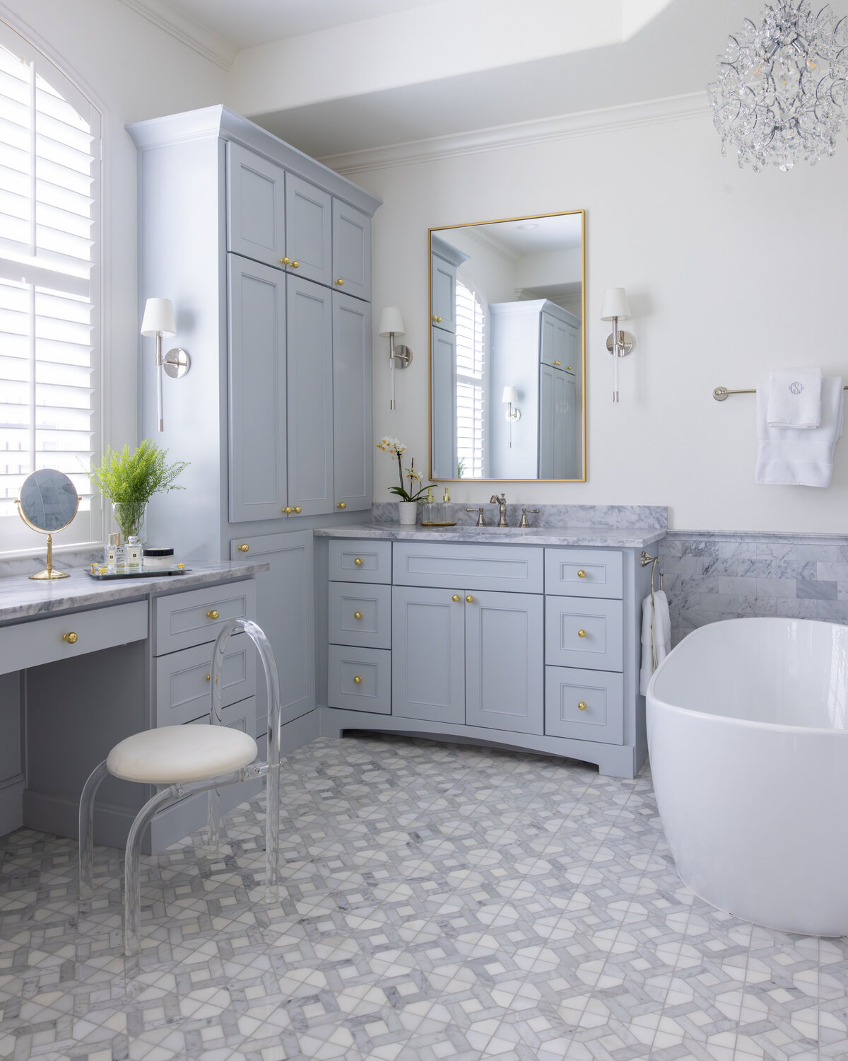 kyleen bushroe interiors pale blue bathroom
