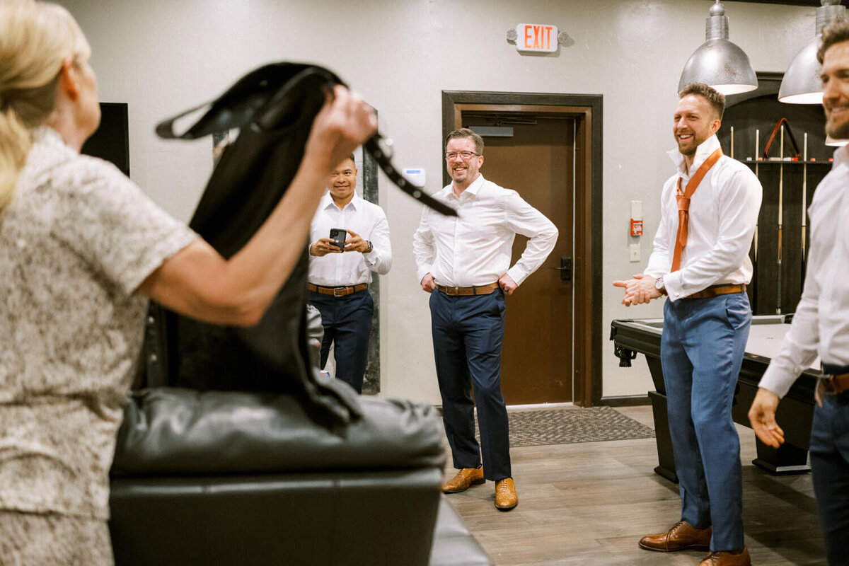 groomsmen-laughing-at-chaps-prank