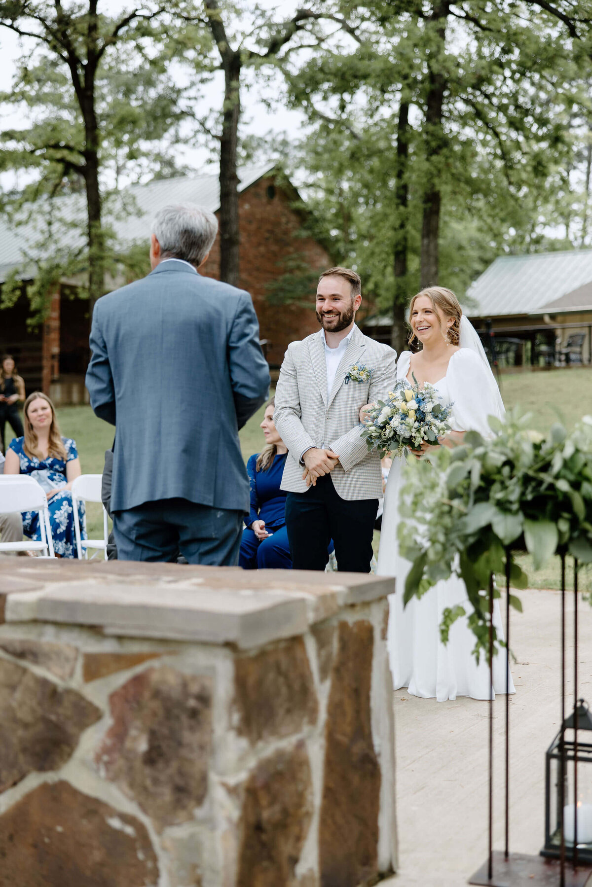 bride and groom at alter duing Texas summer elopement ceremony