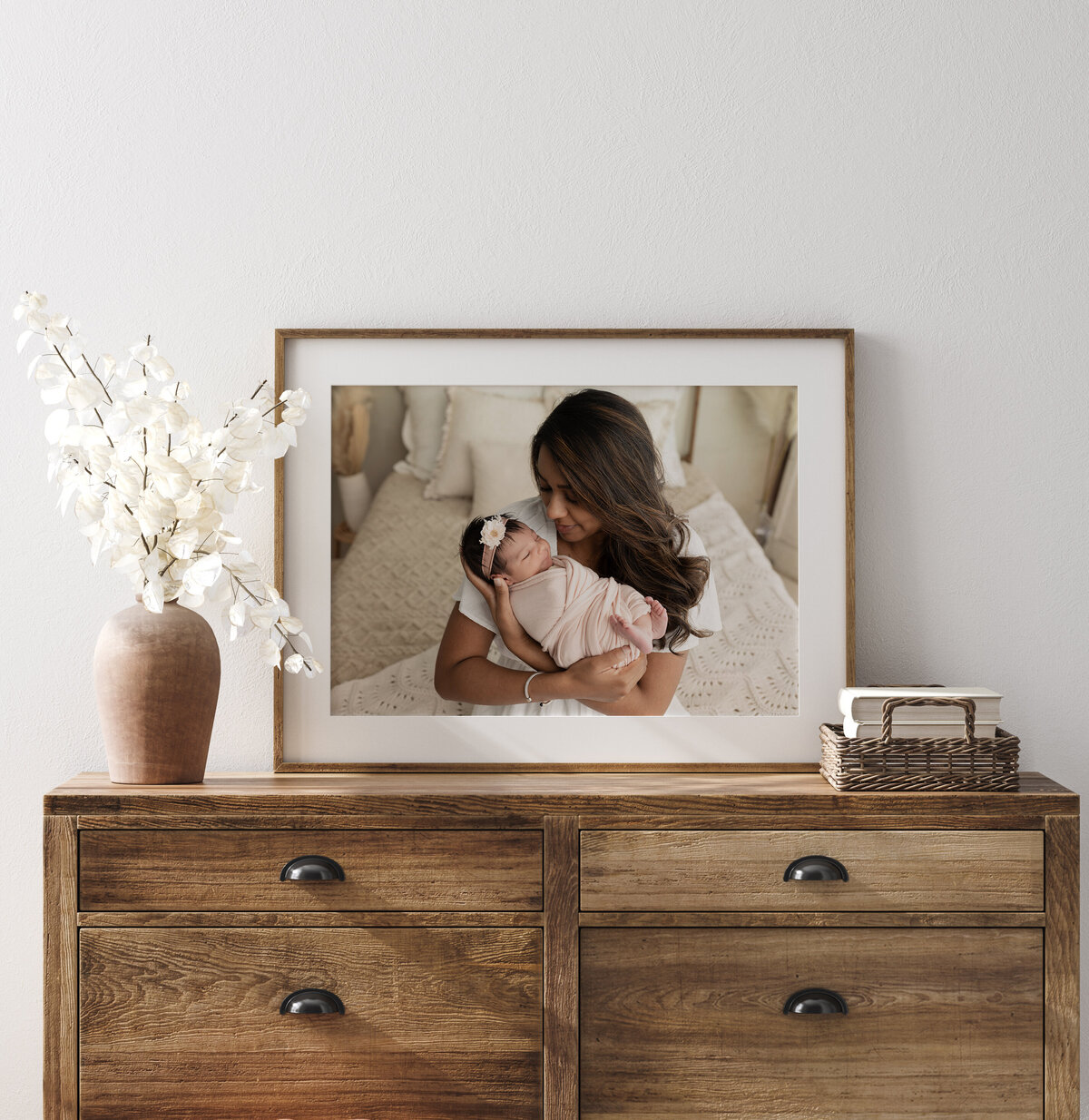 framed photo of mom holding newborn baby girl