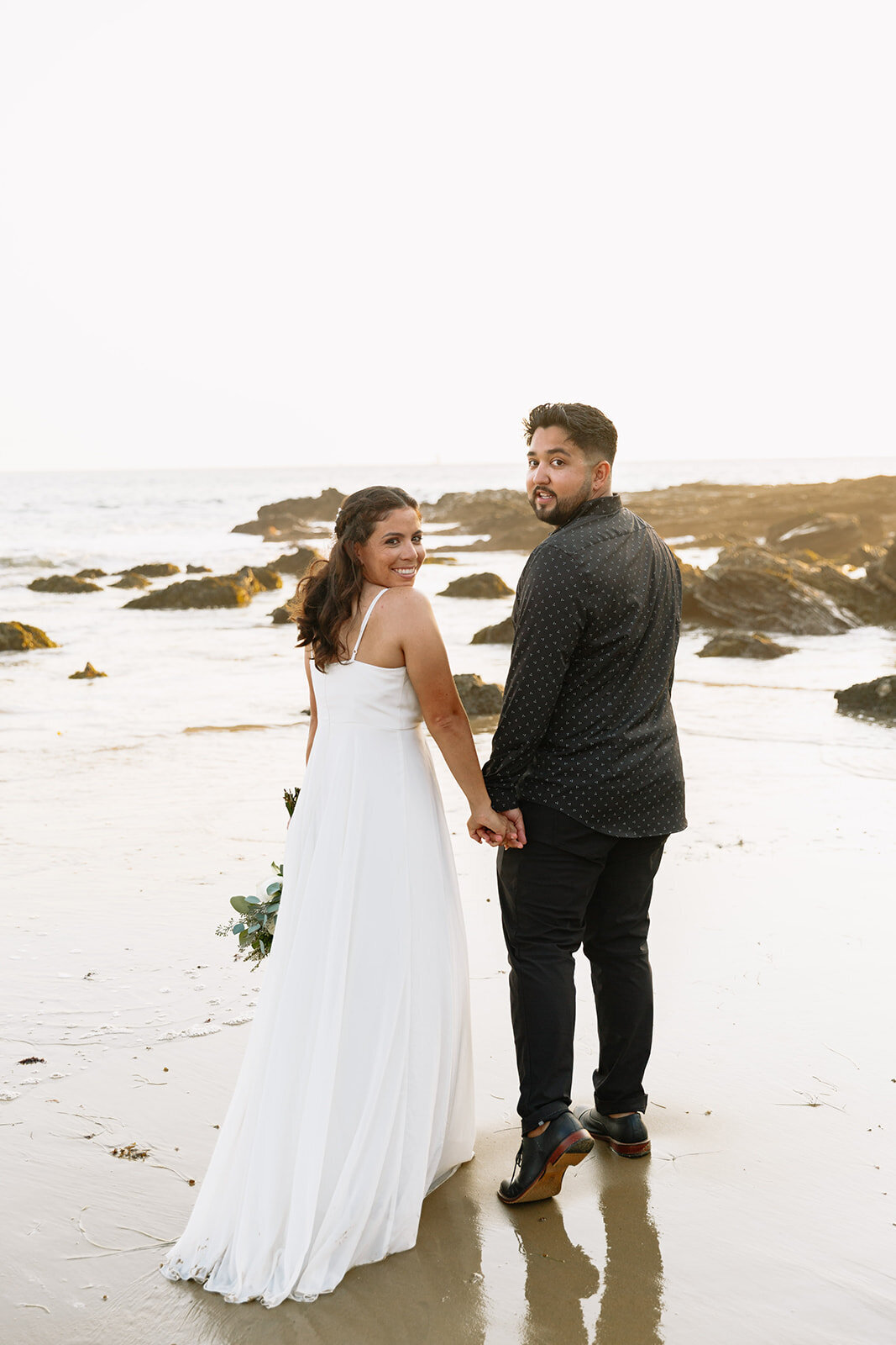 Elopement at El Matador Beach in Malibu, California during golden hour