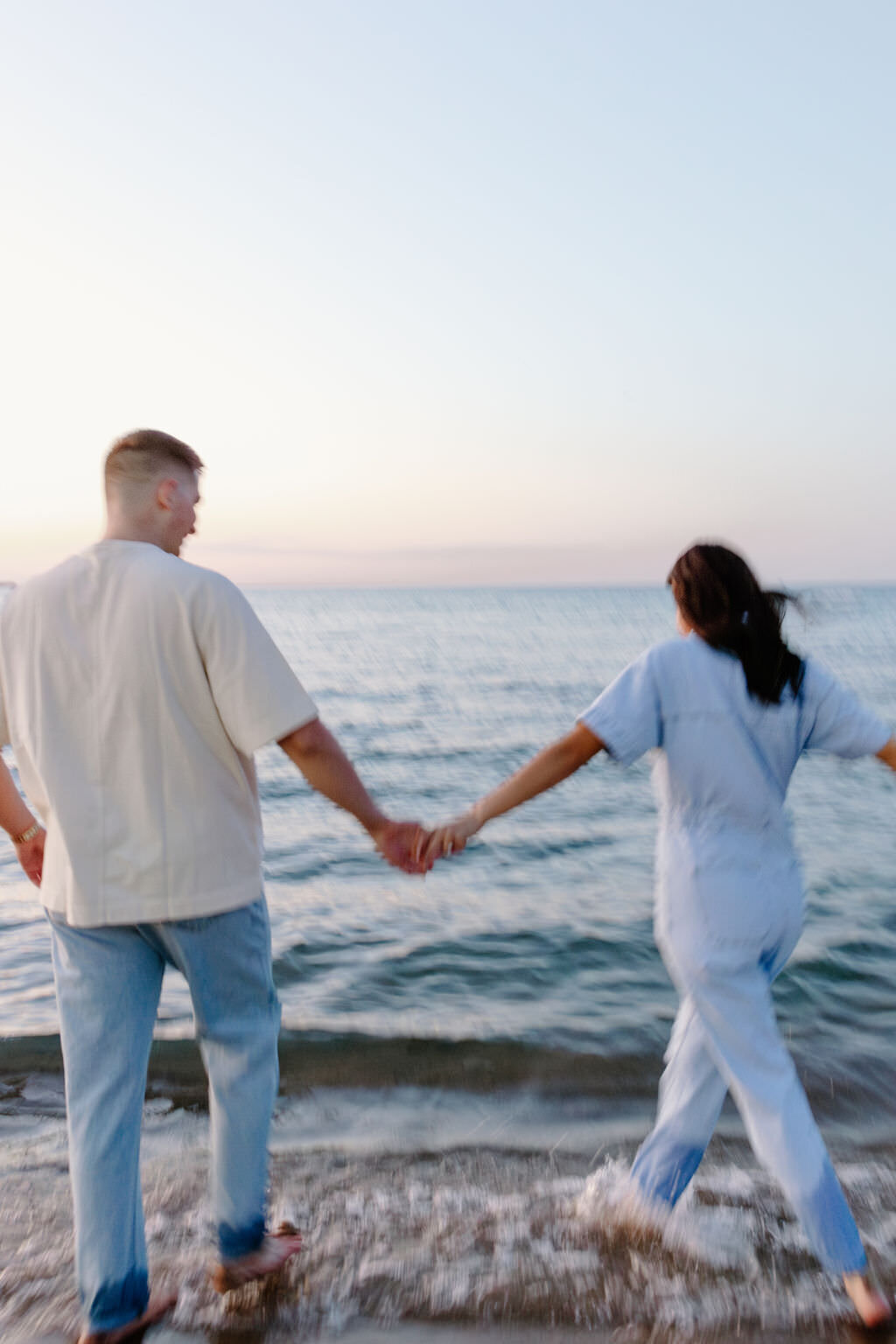 An engagement photography session at The Wrigley Building and North Ave Beach in Chicago, Illinois - 40