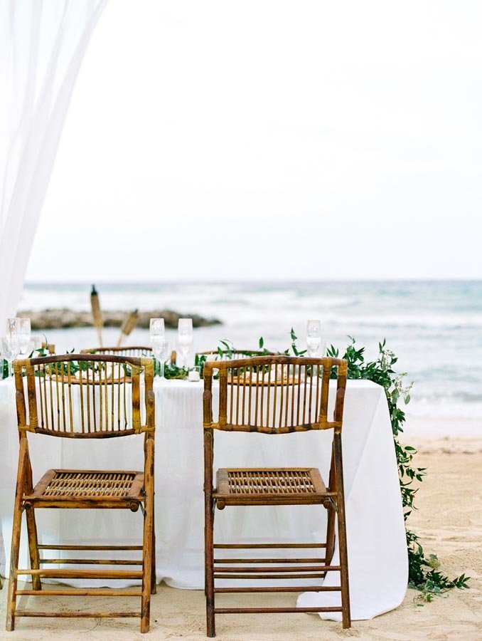 Bamboo Folding Chairs for Tropical Wedding on the Beach © Bonnie Sen Photography