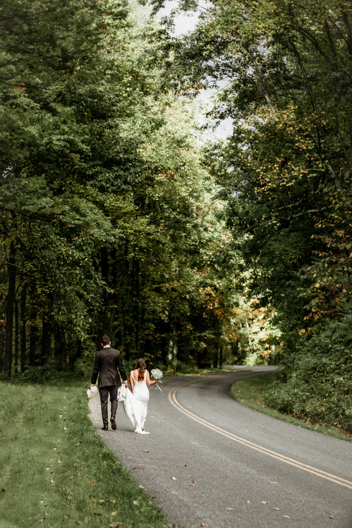 Salem VA wedding and Elopement photographer earthy and moody Charleigh Roberts Photography artsy earthy moody virginia roanoke va east coast north carolina nc pearl veil babys breath kiss happy blue ridge mountains parkway