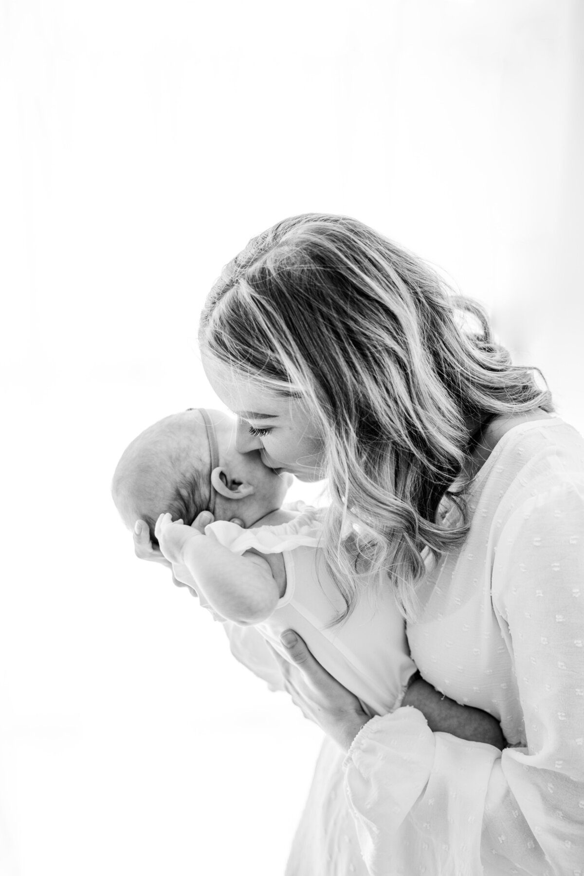 Mom holding new born