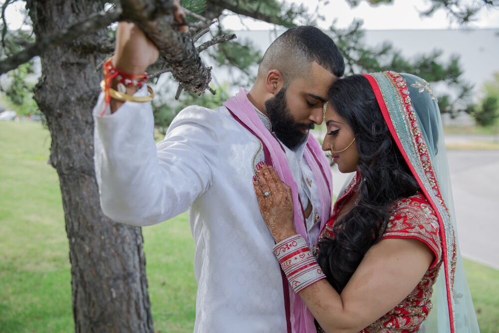 Playful Ottawa bride and groom pose, her makeup vibrant and lively, matching their spirited celebration.