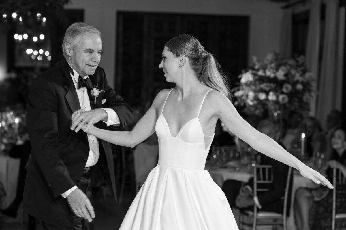 Bride and father dancing