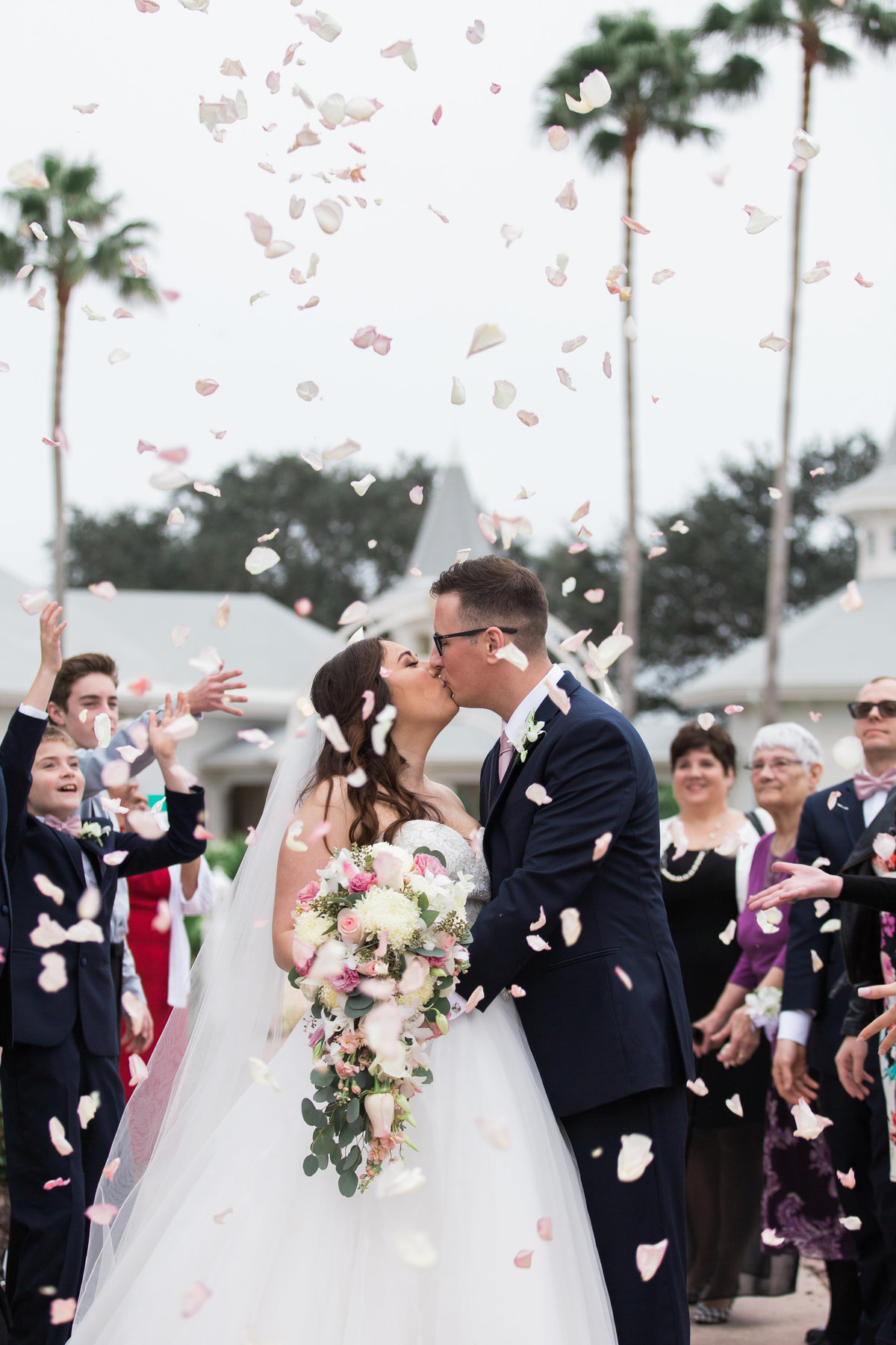 Couple kissing after saying I do in Disney
