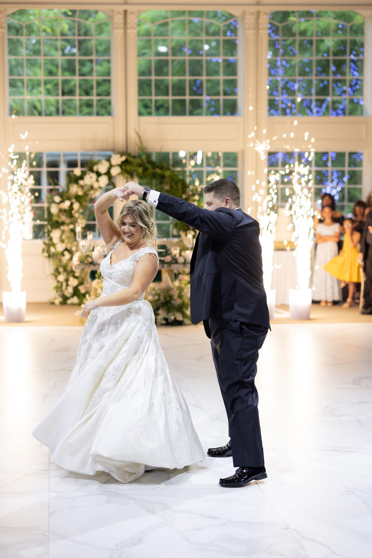 white-green-archway-dance-floor-flowers-dancing-wedding-enza-events