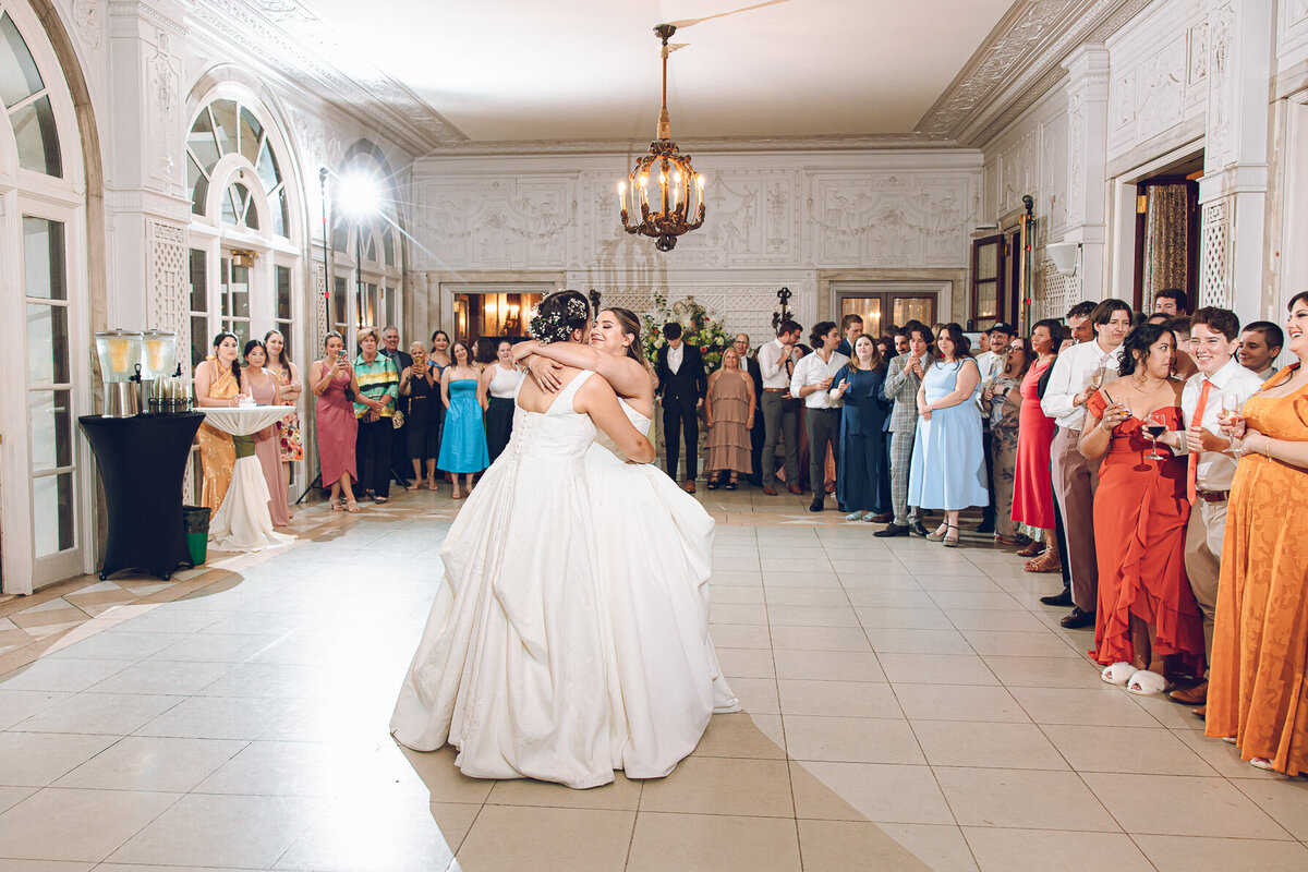 A couple shares their first dance at Armour House in Lake Forest.
