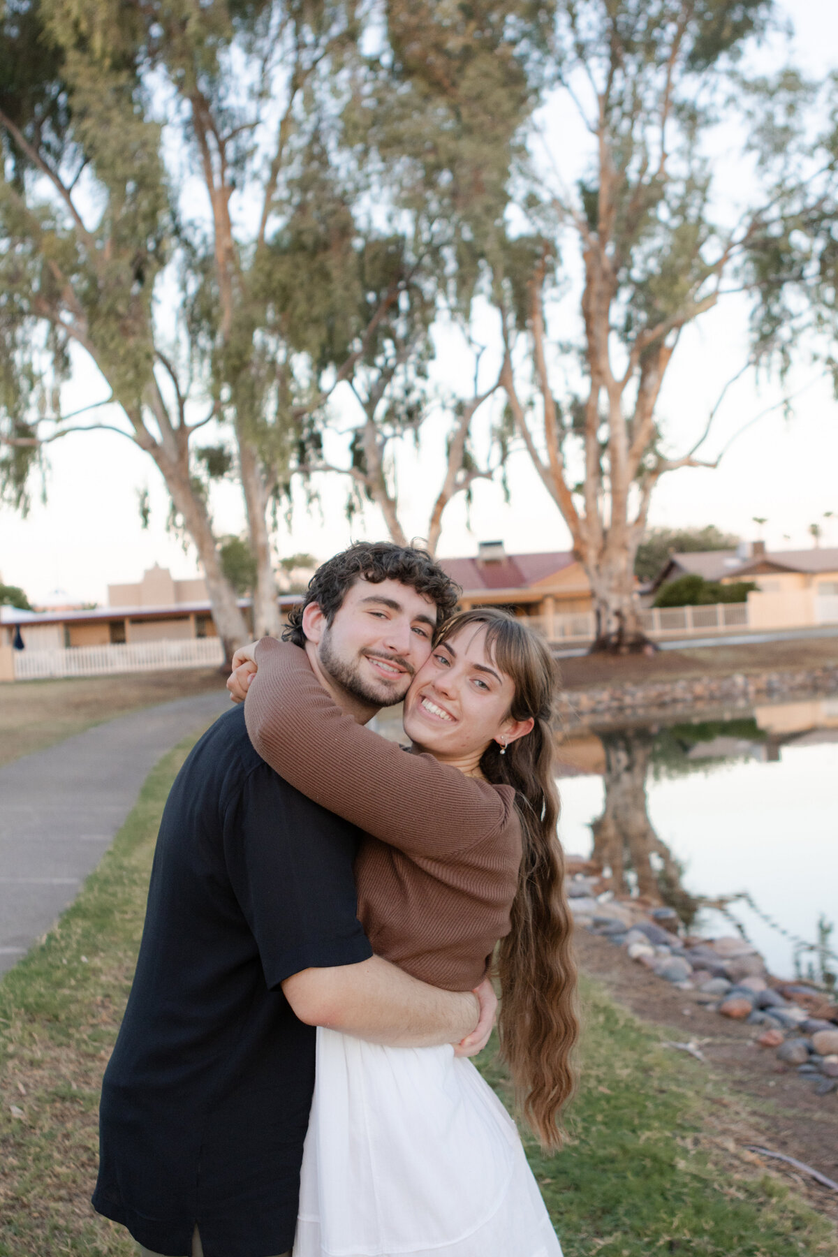 Jovanna G Photography. Classic, sophisticated Wedding Photos. Soft romantic engagement photos. Soft romantic WeddingPhotos. Sophisticated Wedding Photographer. Professional Wedding Photographer. Destination Wedding Photographer. Luxury Wedding photographer. Traveling Wedding Photographer. AZ Wedding Photographer. Gilbert AZ Wedding Photographer. Queen Creek Wedding Photographer. Phoenix Wedding Photographer. Scottsdale Wedding Photographer. Flagstaff Wedding Photographer. SoCal Wedding Photographer. California Wedding Photographer. Northern California Wedding Photographer. Southern California Wedding Photographer. San Francisco Wedding Photographer. Bay Area Wedding Photographer. San Jose Wedding Photographer. Golden Gate Bridge Wedding Photographer. Beach Lover Wedding Photographer. Palace of the Fine Arts Wedding Photographer. Ocean Lover. I love California. Orange County Wedding Photographer. Newport Beach Couples Photographer. Newport Beach Wedding Photographer. Laguna Beach Couples Beach Engagement Photographer. Laguna Beach wedding beach photographer. Los Angeles Wedding Photographer. Young and in love engaged couples who live in southern California. Christian Young Couple. Young Engaged Couple. Engaged High School Christian Couple. Christian Values. Young conservative Christian women. Young Conservative Christian men. Young Conservative Christian Couple. Young Christian Couple Engaged in High School. Young Christian College Couple. Lakeside Lovers in the Autumn Sun. David & Grace - engagement photos. Jovanna G Photographer Engagement Photos. Arizona sun shining through autumn trees- engagement. Chandler, AZ Engagement Photos. Chandler, AZ 2026 bride. Chandler, AZ Wedding Photographer. Chandler, AZ Young Engaged Couple. Girl in her 20s. Engaged Arizona Girl in her 20s. Lakeside Engagement photos. AZ Lakeside Engagement Photos. AZ Weeping Willow Lakeside Proposal. Arizona Lakeside Proposal with weeping willow tree. Detail shot of engagement ring on Arizona Lakeside estate. Chandler, AZ Lakeside Estate Proposal Outfit Inspiration.