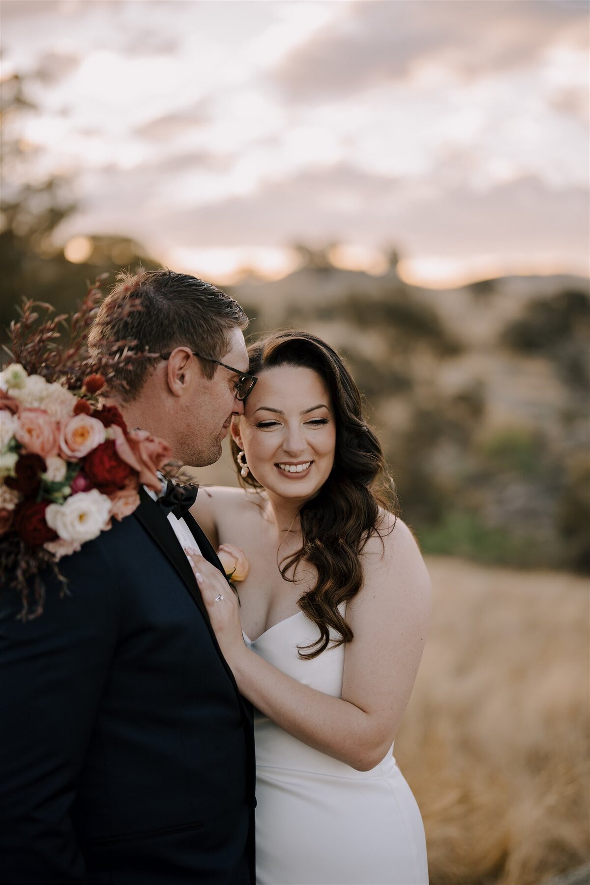 Editorial Wedding Photography Melbourne, capturing couples embracing in the natural beauty of golden hour