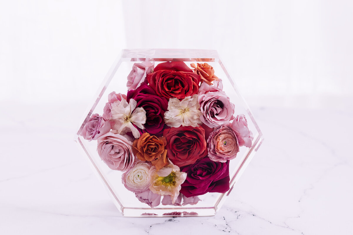 sunset color bouquet preserved in resin hexagon