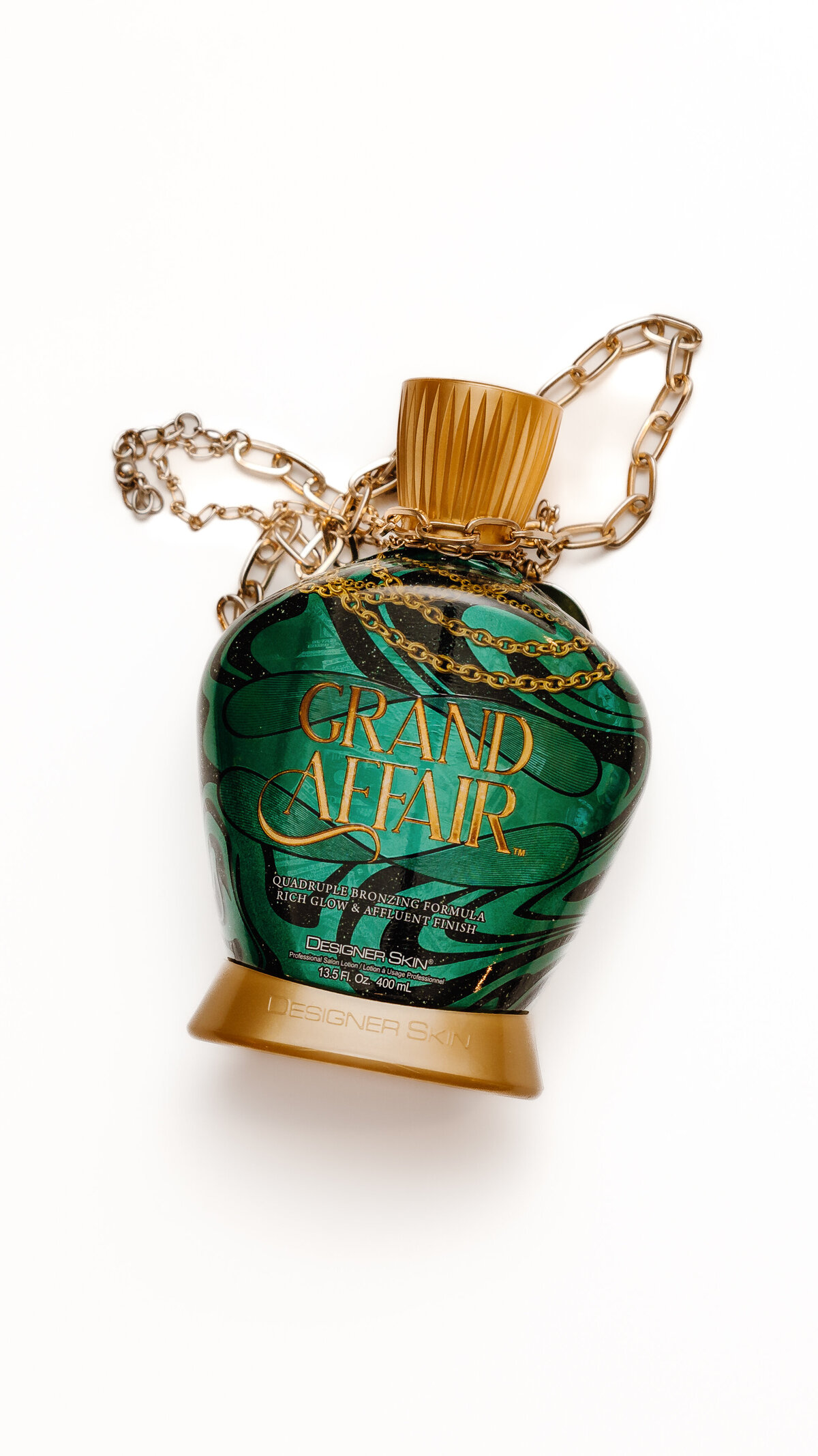 A perfume bottle with chains around it