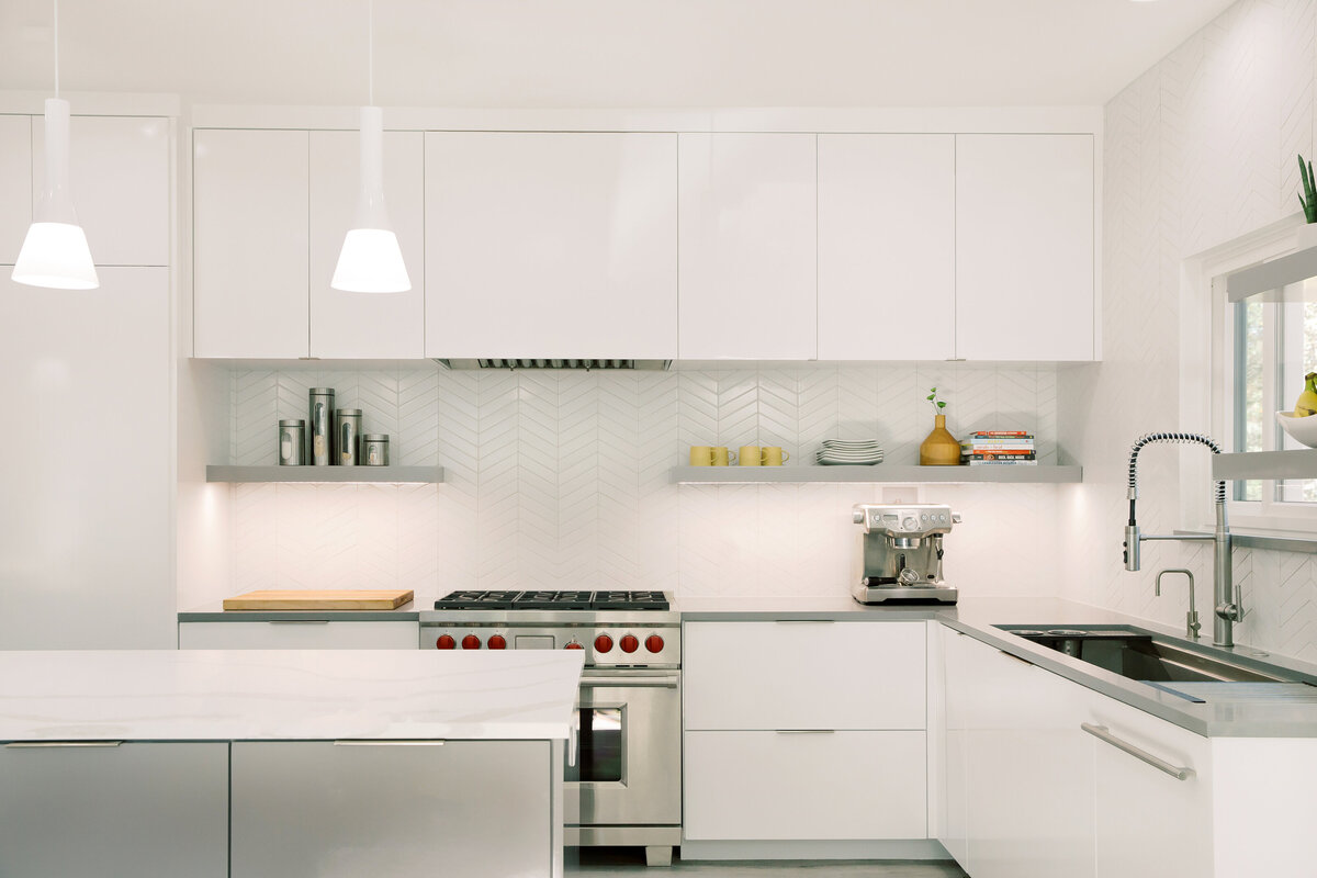 hello-home-sleek-modern-grey-and-white-kitchen-long-workstation-sink-cheveron-tile-backsplash-austin-8