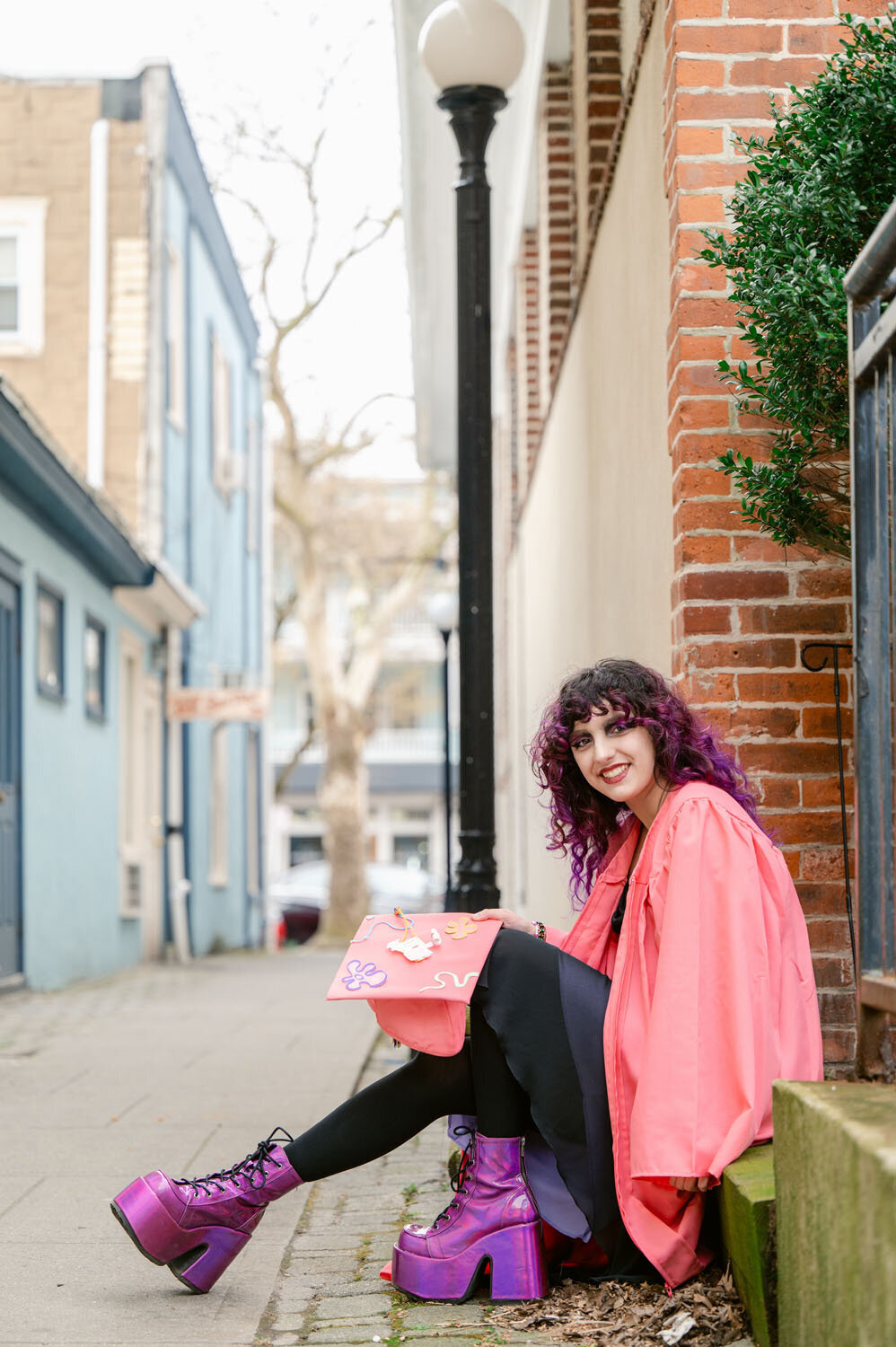 NJ senior photoshoot fun pink cap and gown asbury park-363