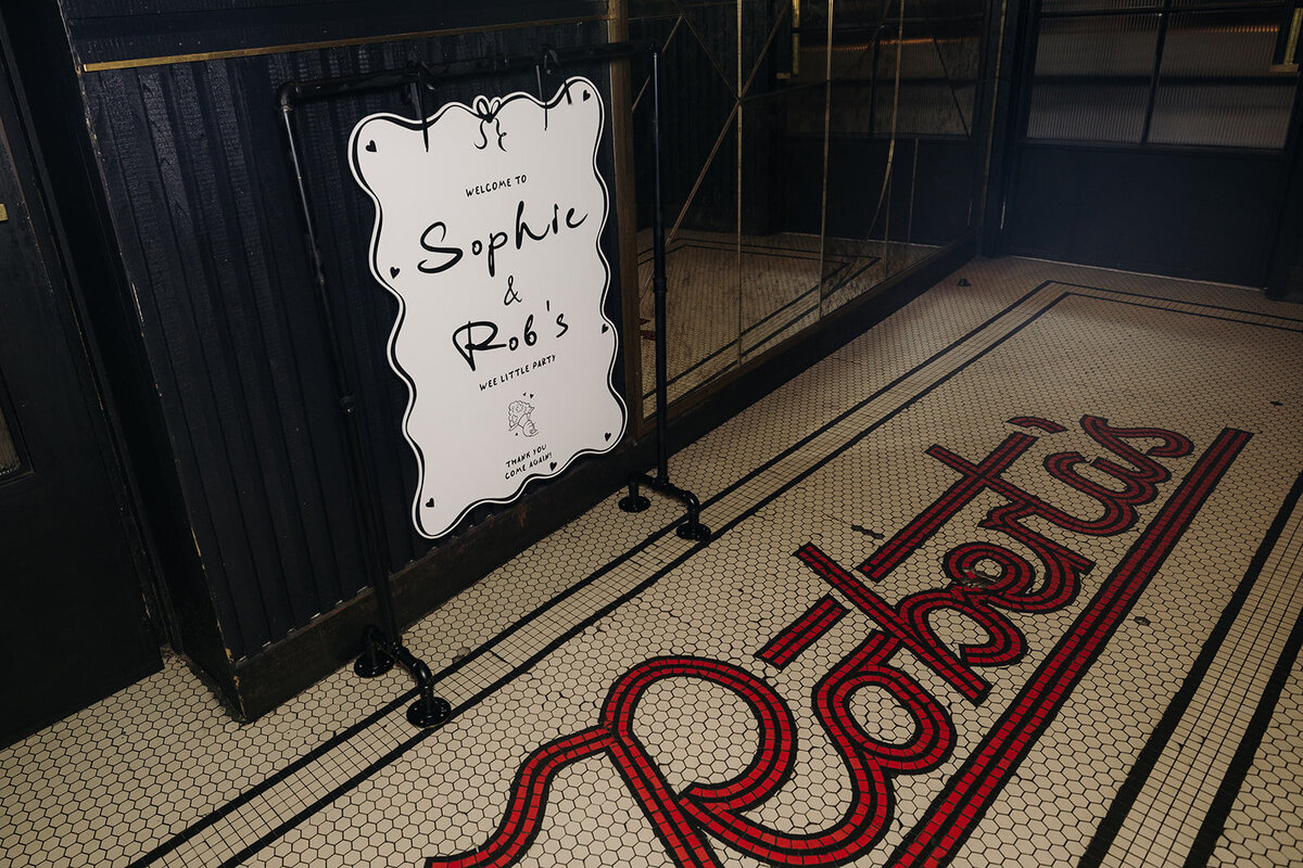 Black and white chic wedding welcome sign at Roberta’s in Dublin, Ireland