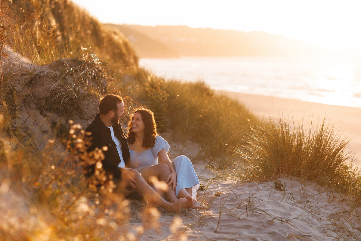 Golden hour portraits in the sand dunes in Cornwall