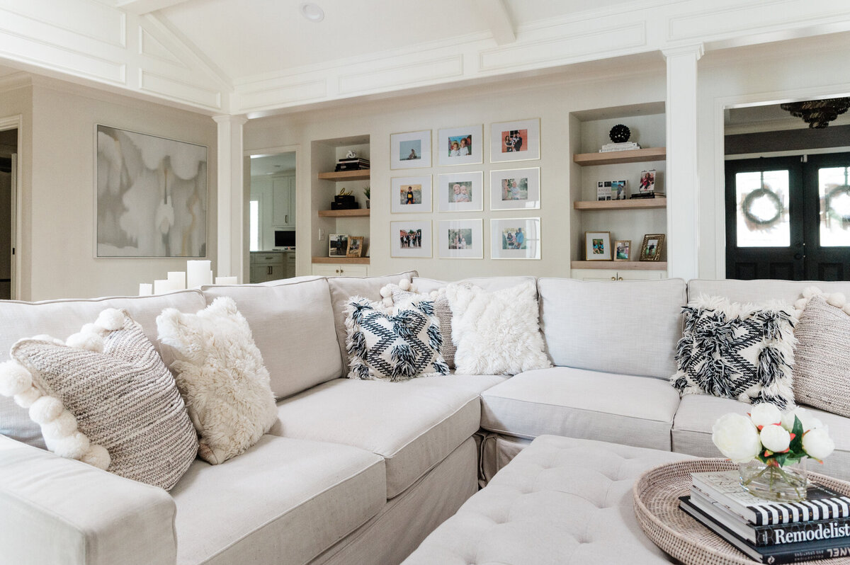 Living area of a dallas home with a gallery wall