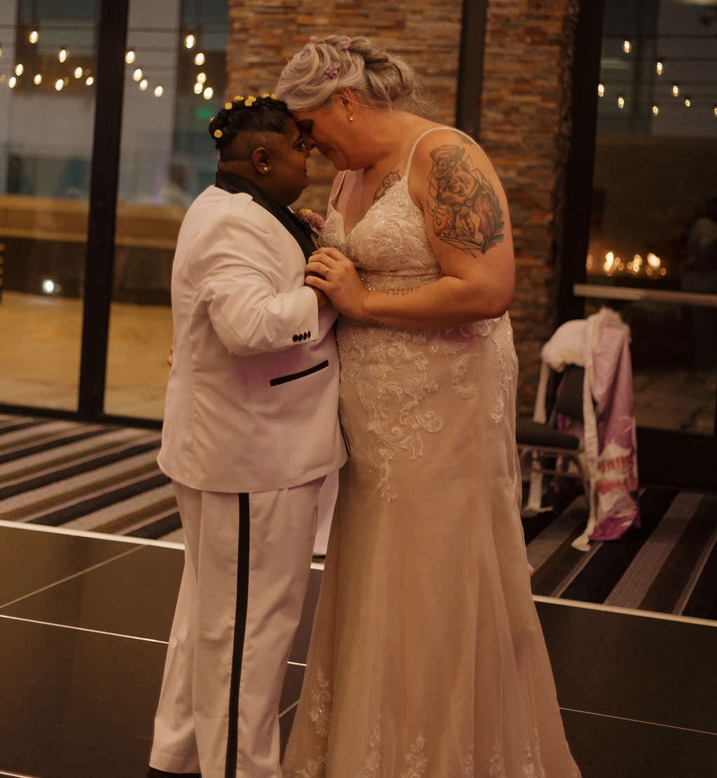 A newlywed couple during their first dance.