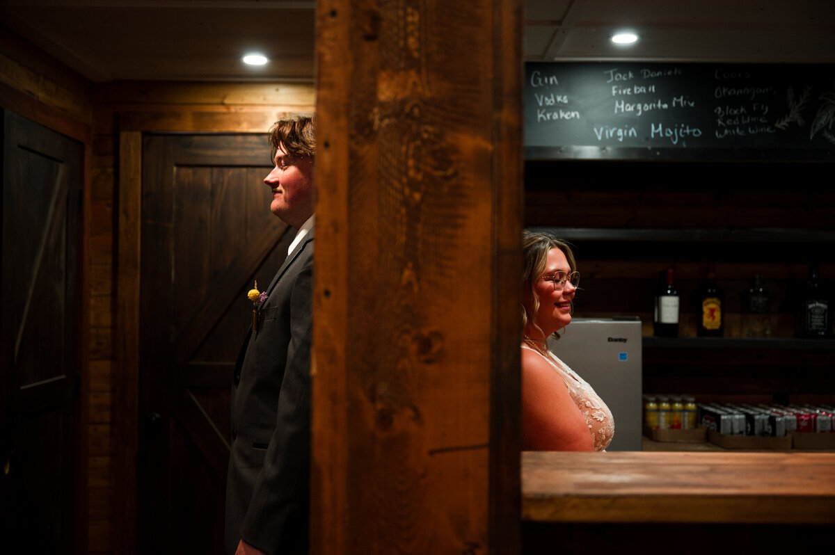bride and groom share first touch