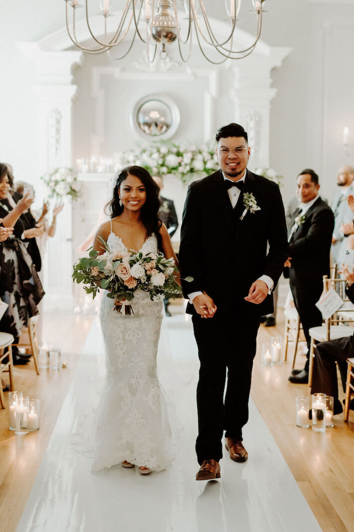 bride and groom walking down the aisle