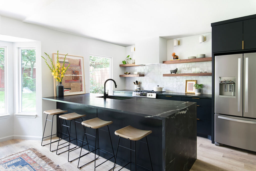 hello-home-austin-black-scandinavian-kitchen-waterfall-peninsula-zelliege-backsplash-black-cabinets-1