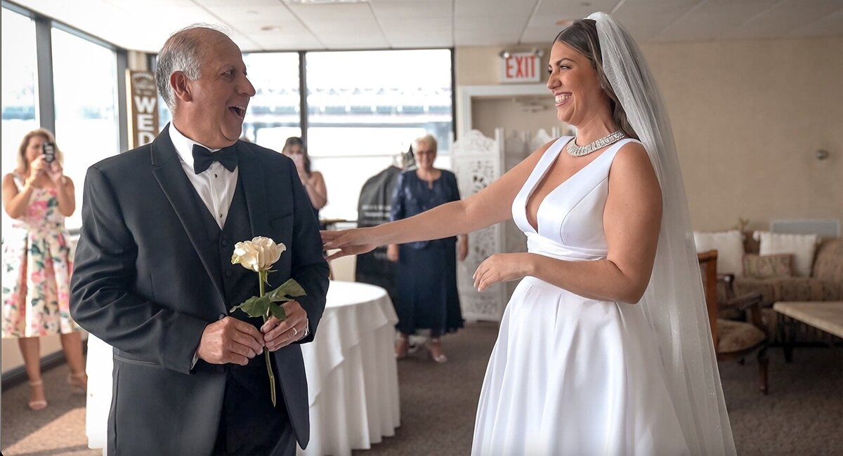 Bride and Dad's first look n Giando's bridal suite.