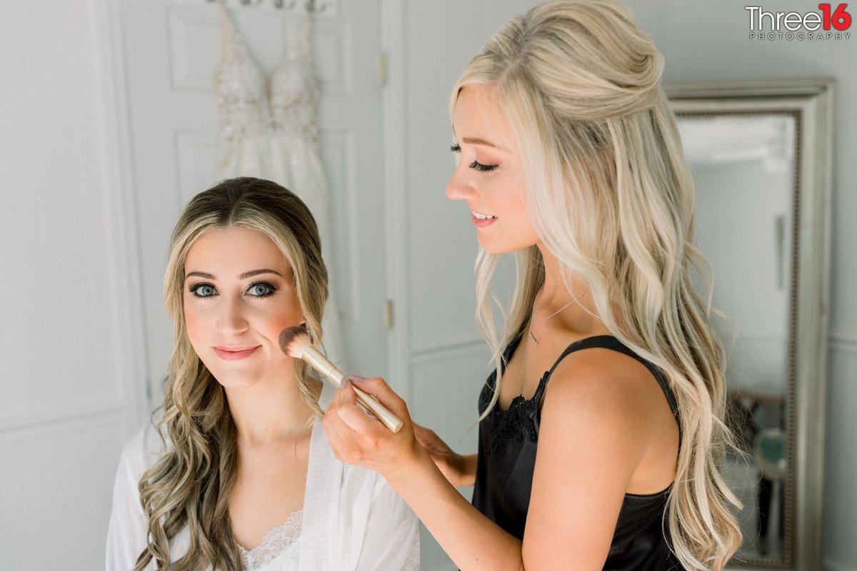 Last minute makeup for the Bride