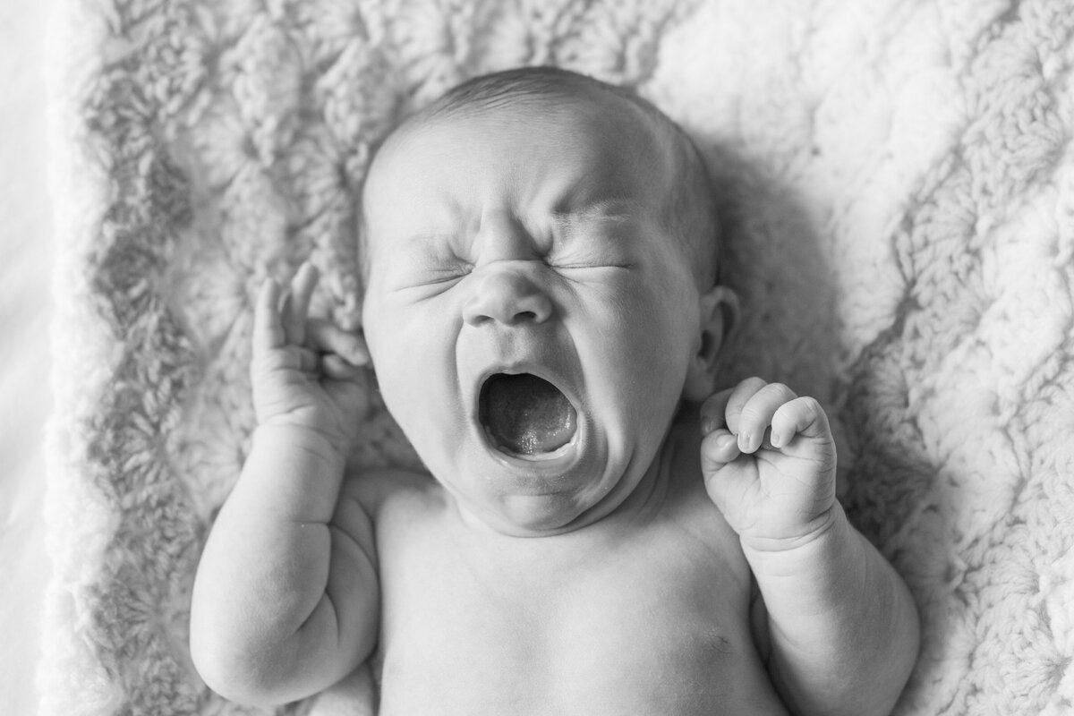 Newborn baby yawning Asheville NC photography