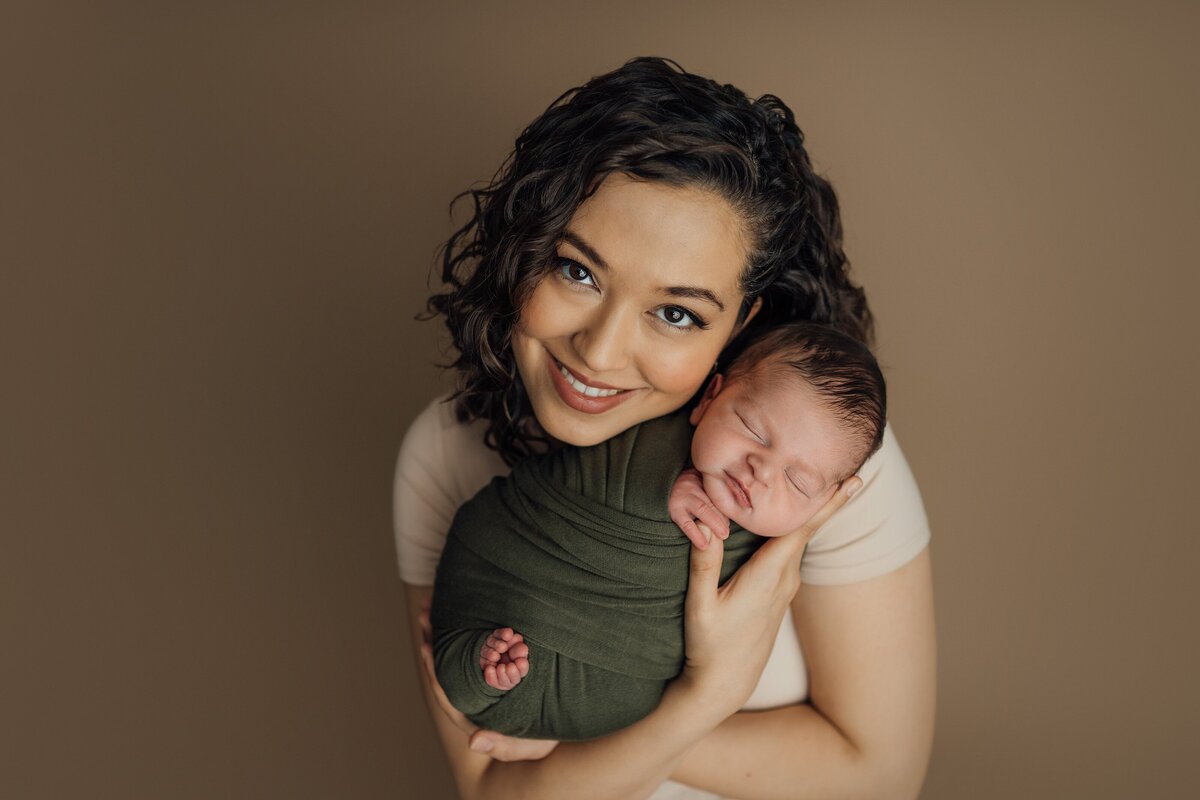 mom and baby during newborn session in tampa
