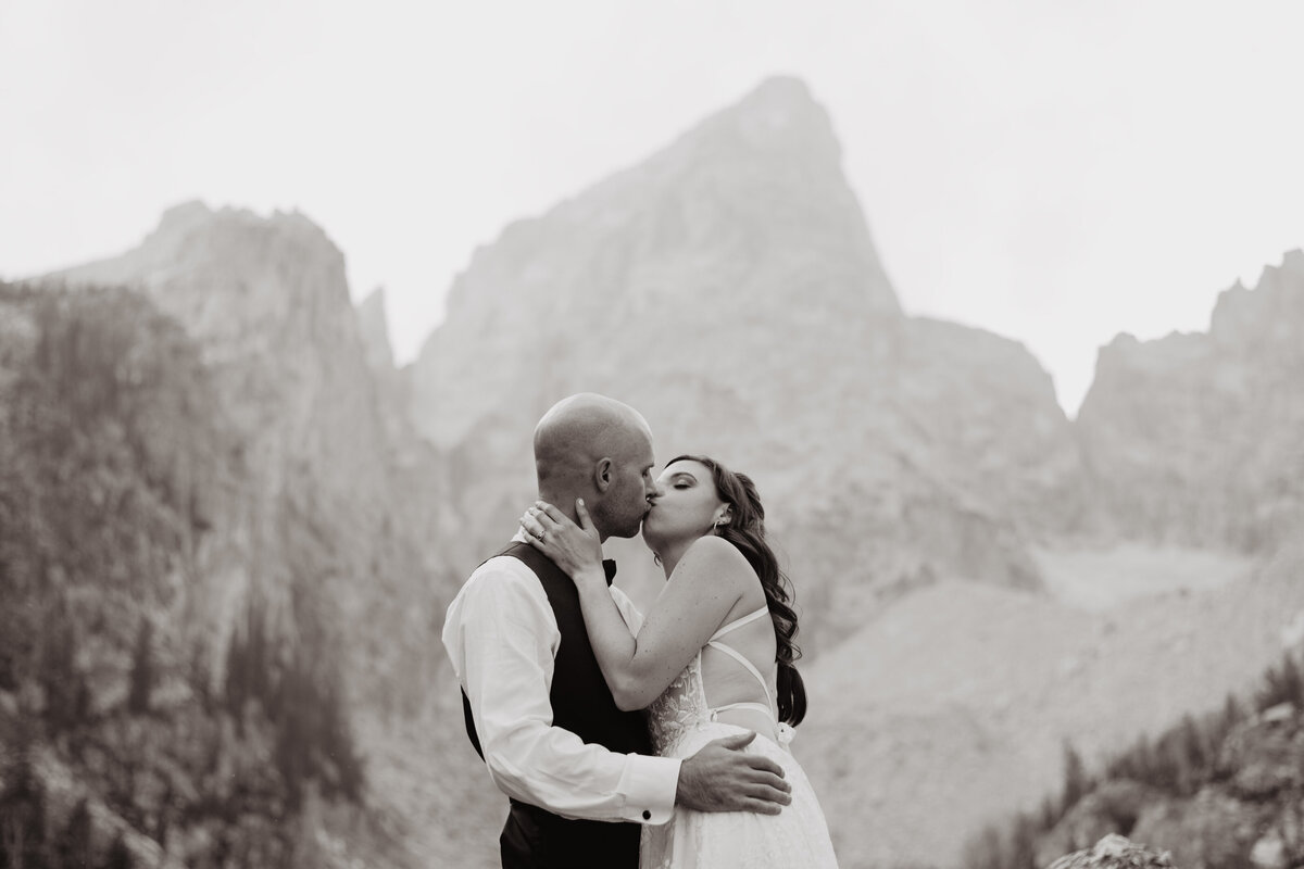 Jackson Hole Photographers capture couple kissing in black and white portraits