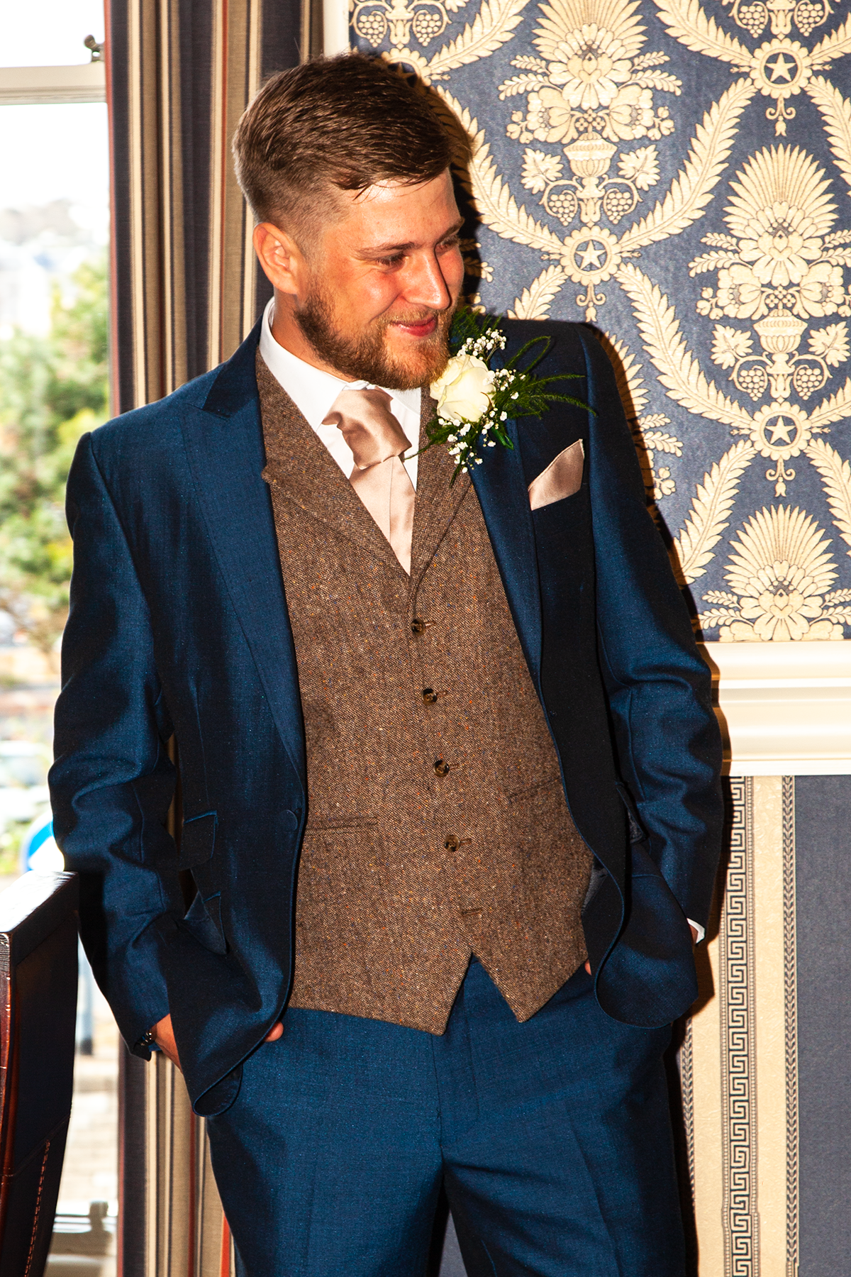 pro-story-photography_proud-groom-nervously-waits_duke-of-cornwall-hotel_plymouth