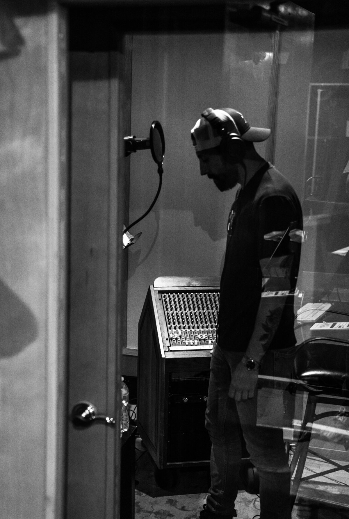 Matthew Ramsey recording vocals in recording studio
