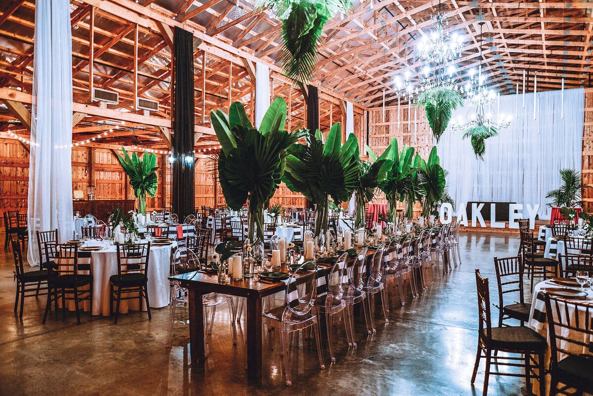 Miami themed wedding at Saddle Wood Farms with palm leaves and banana leaves