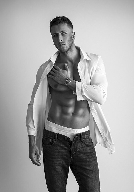 Calvin Klein style portrait of man in black and white.