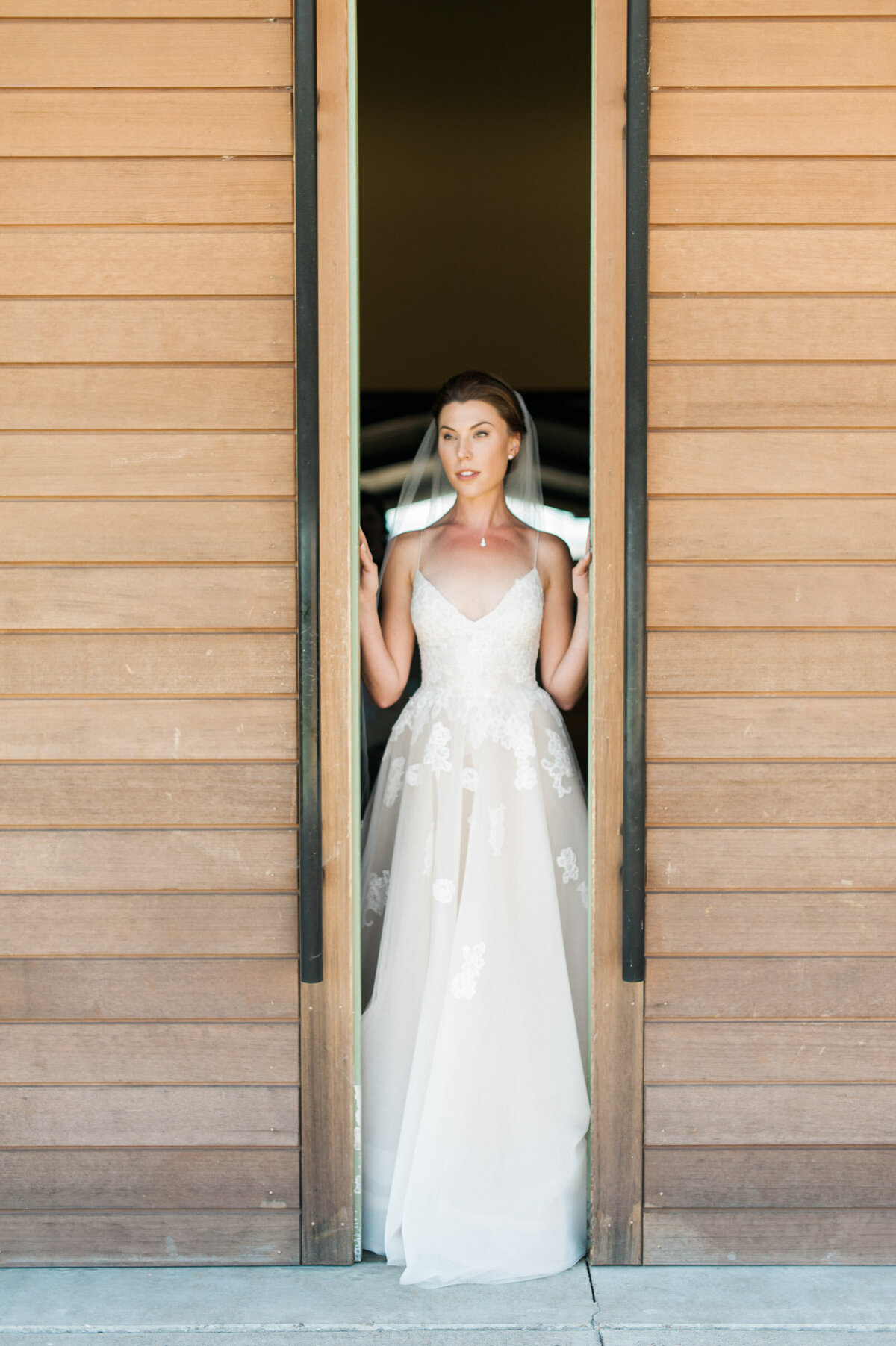 bridal portrait at ponzi winery in the big double doors