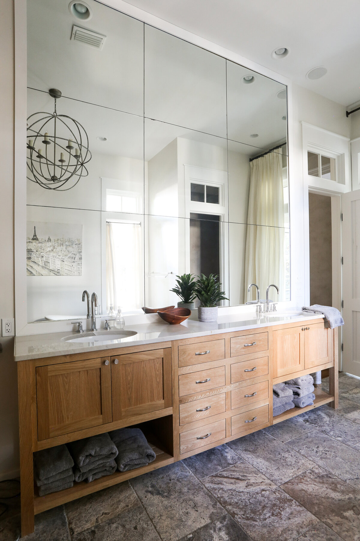 large-bath-vanity-mirrored-wall-tall-ceiling