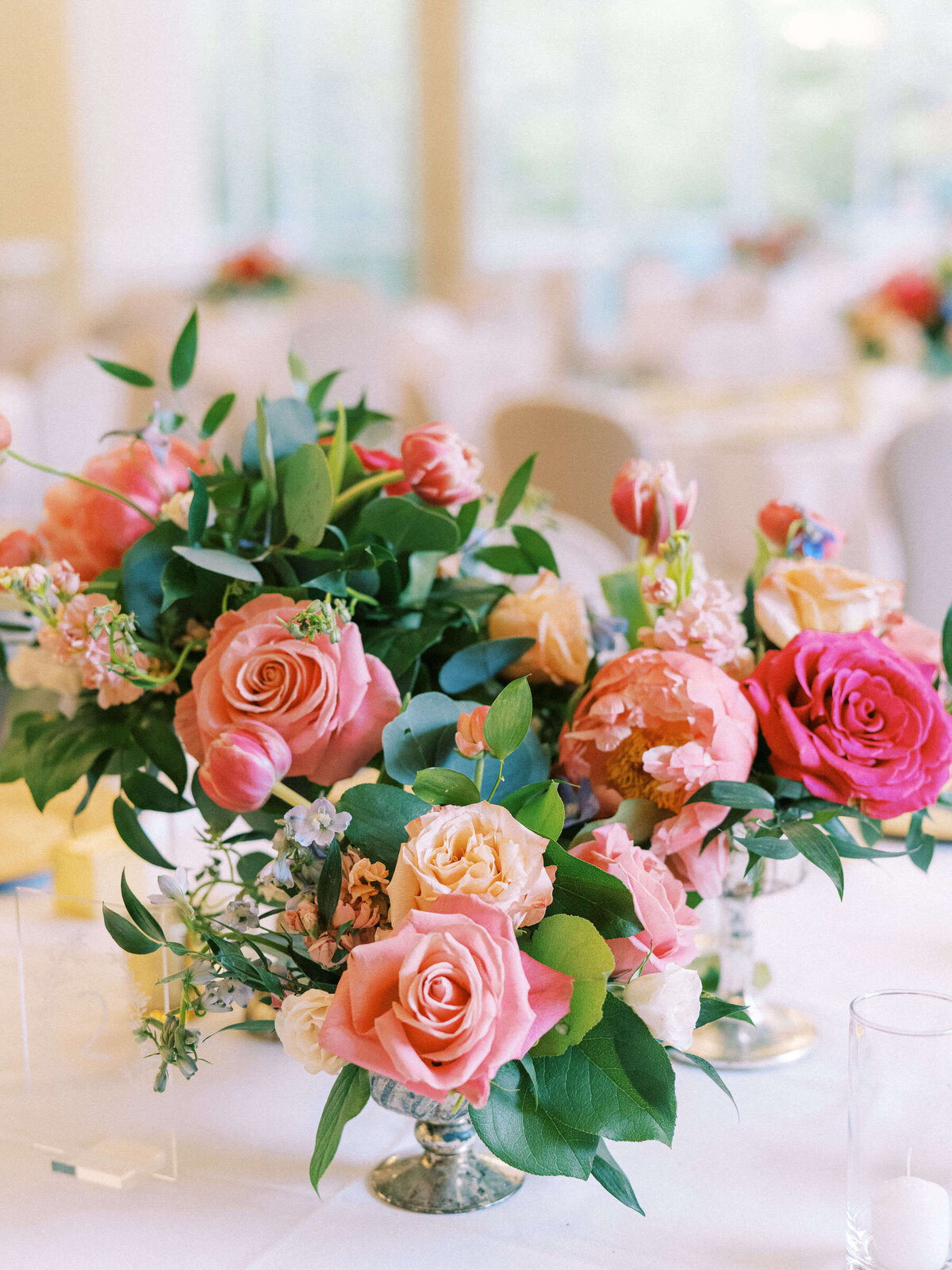 Vibrant table flower bouquet at Dallas Texas wedding