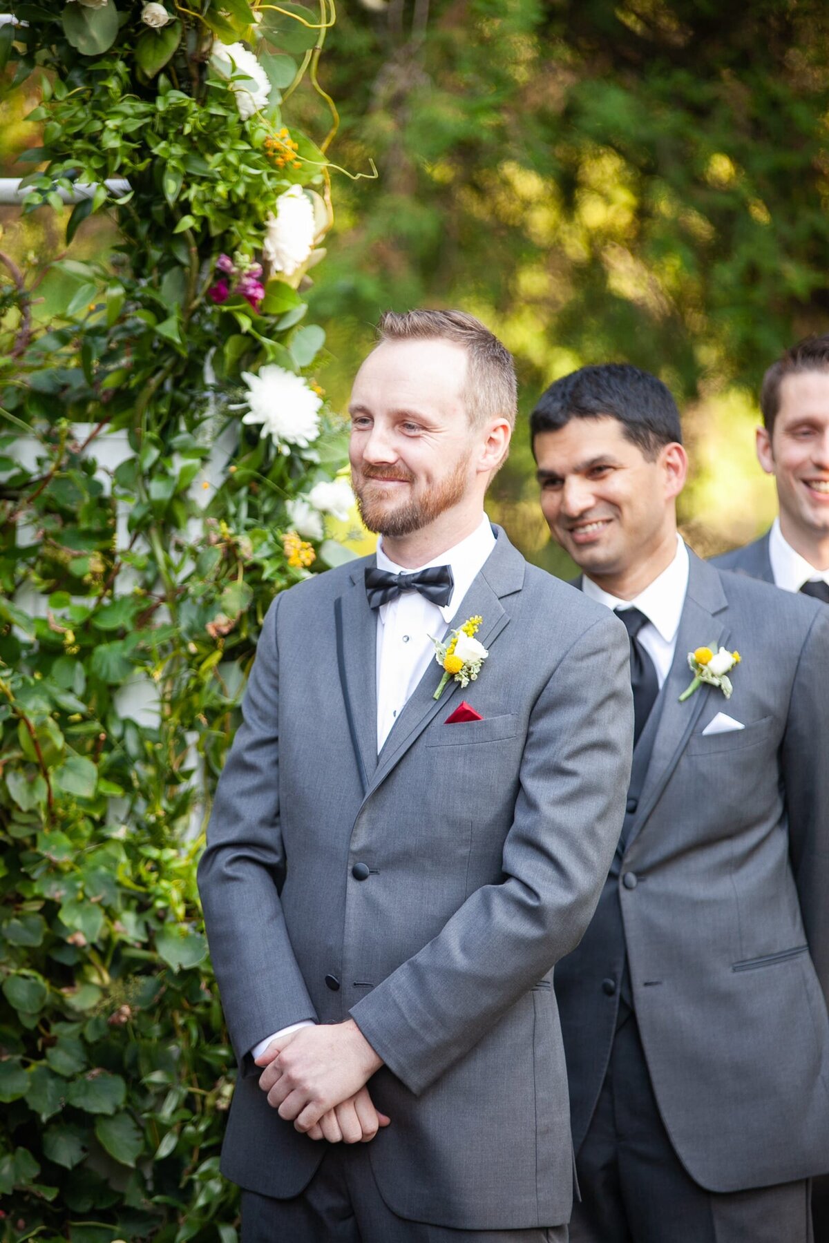 groom-ceremony-grey-suit-bow-tie