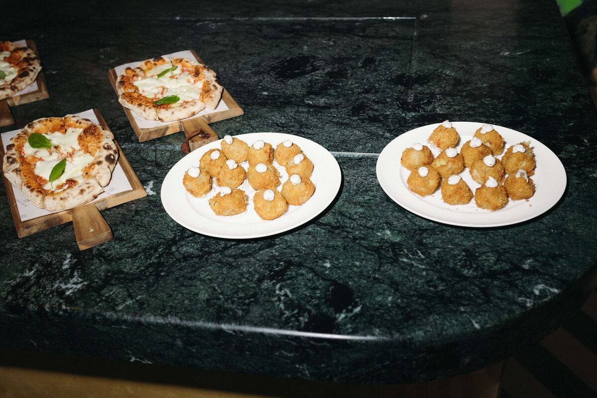 Table with delicious Italian aperitivo during wedding cocktail hour

